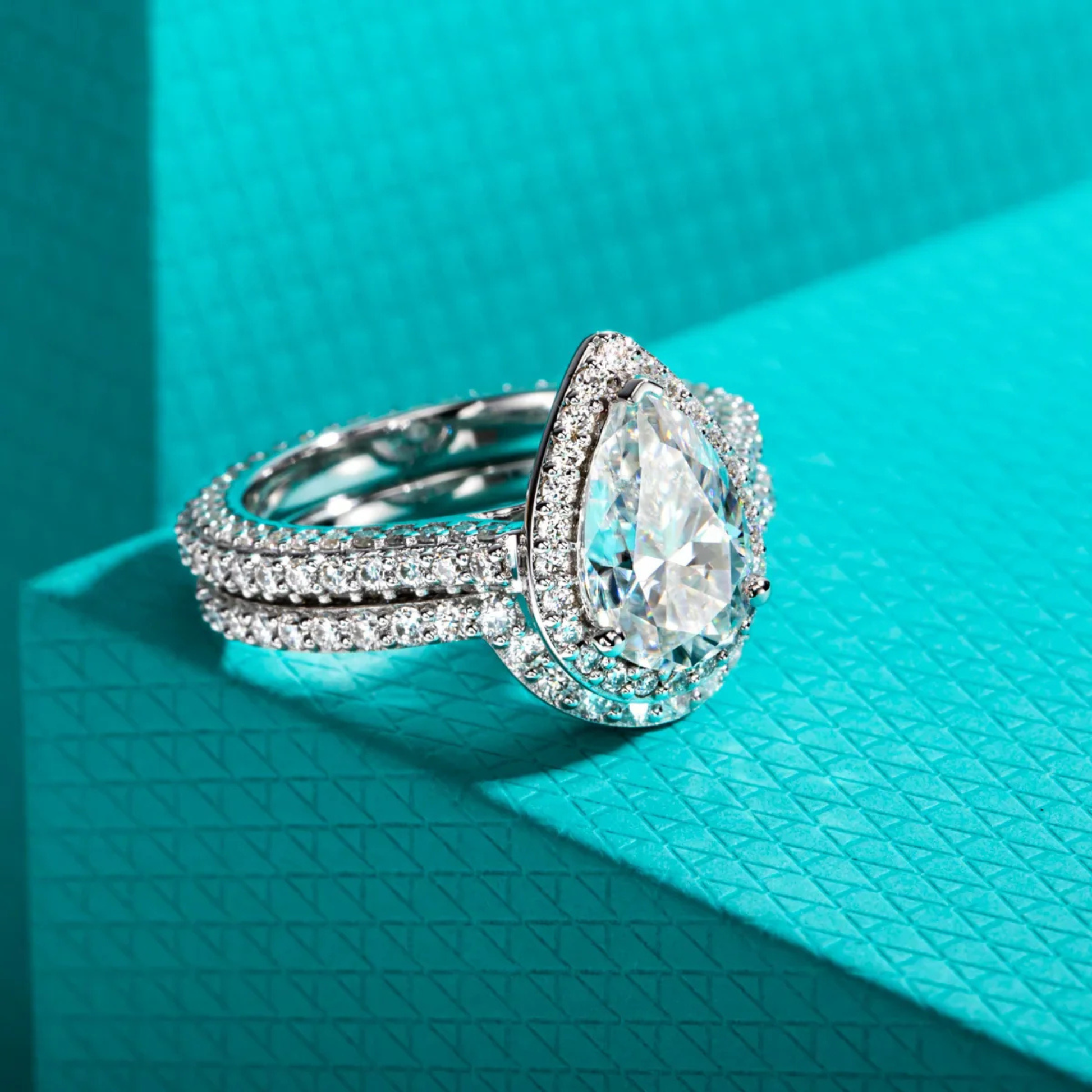 4.8 CTTW Pear Cut Moissanite Halo Bridal Ring