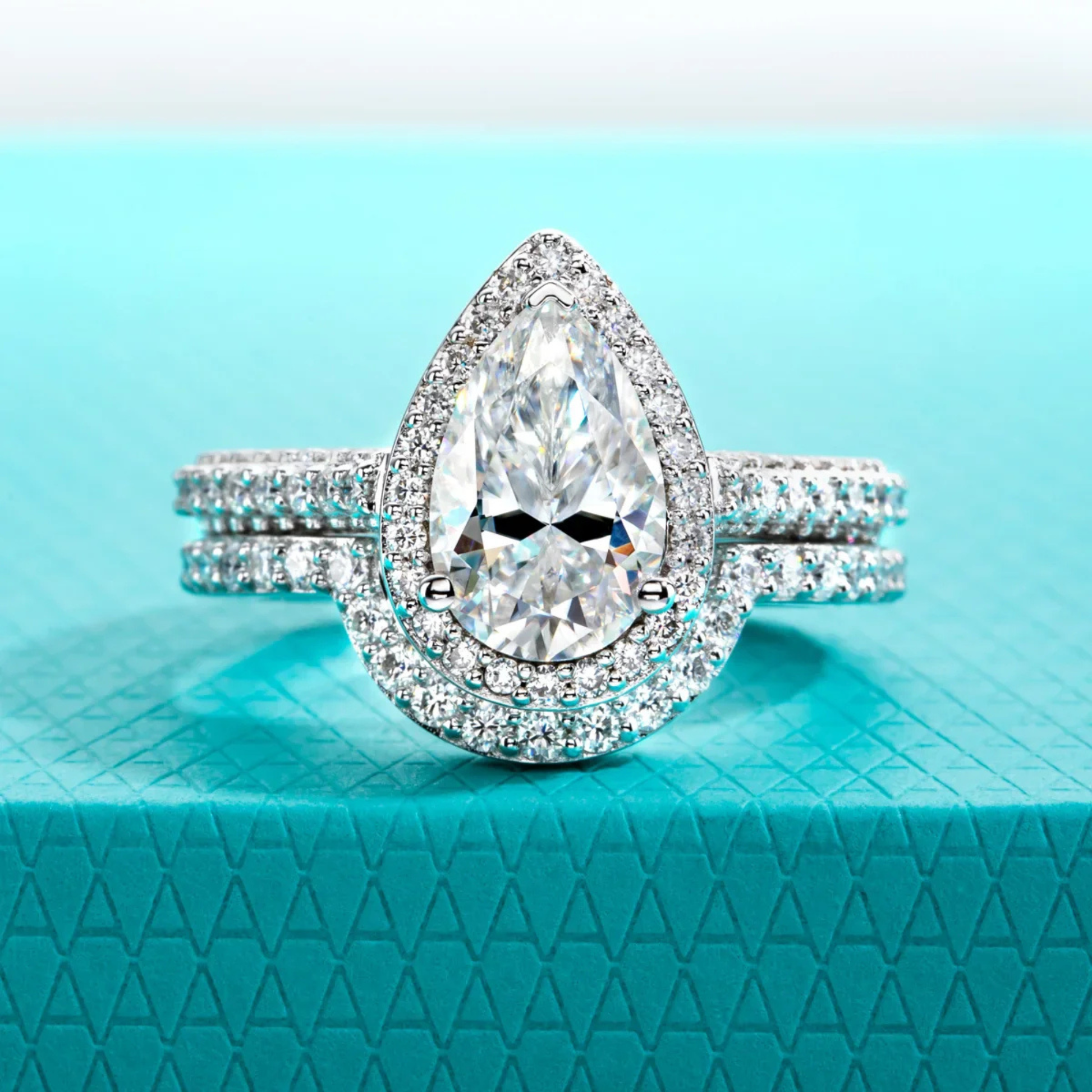 4.8 CTTW Pear Cut Moissanite Halo Bridal Ring